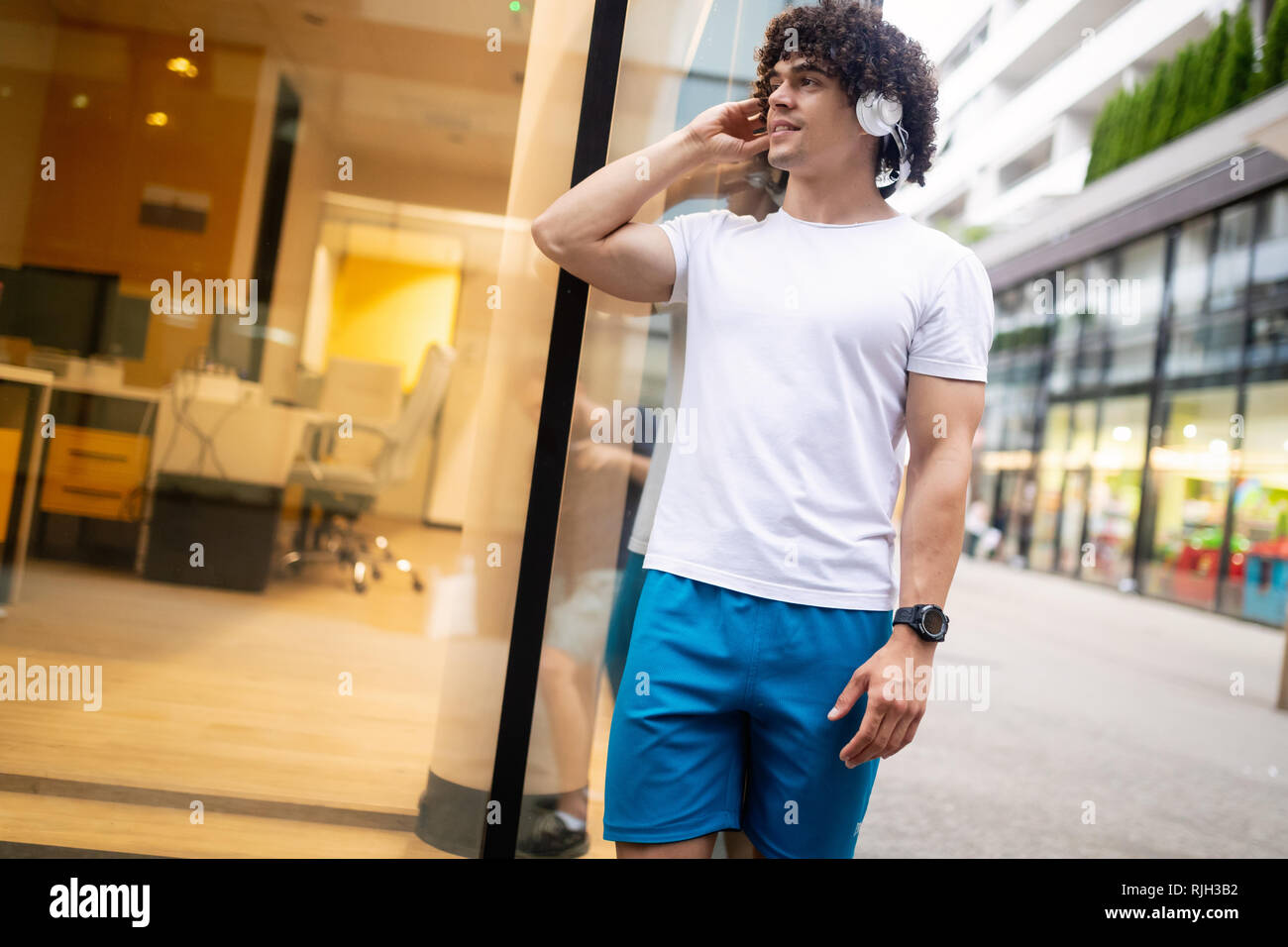 Portrait of fit and sporty young man outdoor Stock Photo - Alamy