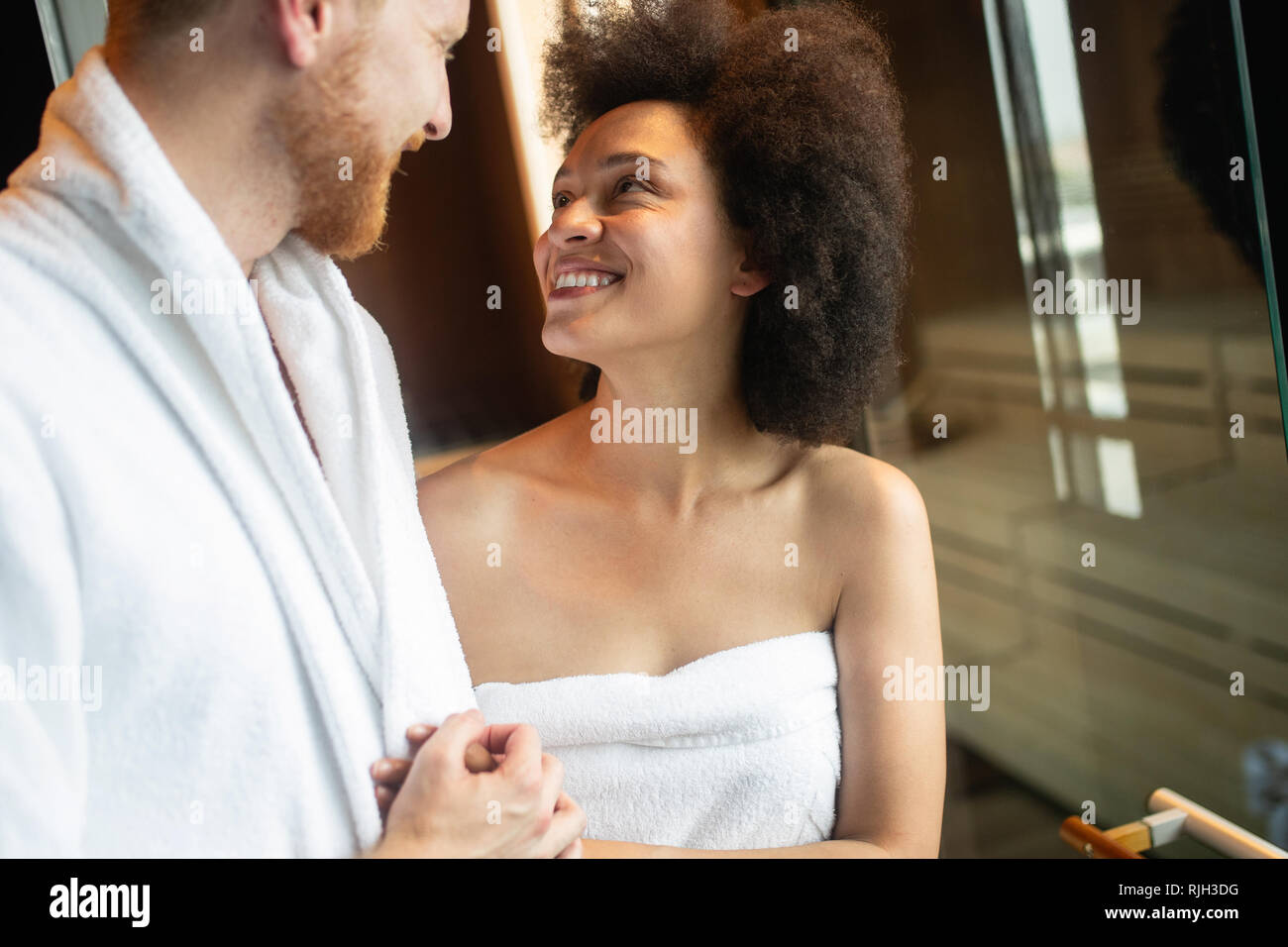 Young man and woman in luxury spa and wellness center Stock Photo
