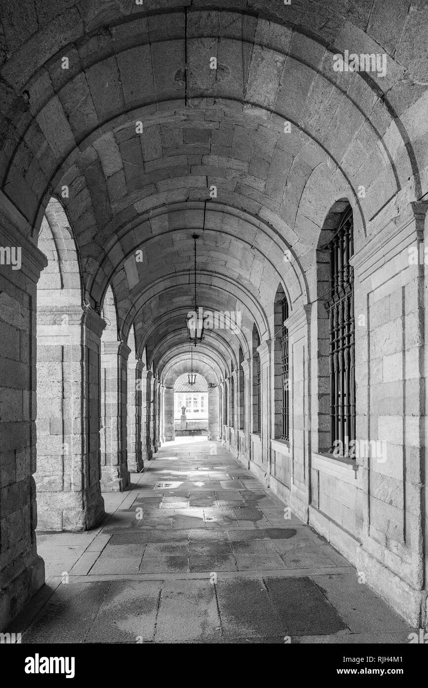 Arch pathway at the Palacio de Raxoi, Santiago de Compostela, Spain. Barrel vault architecture detail. Neoclasic building of century XVIII Stock Photo