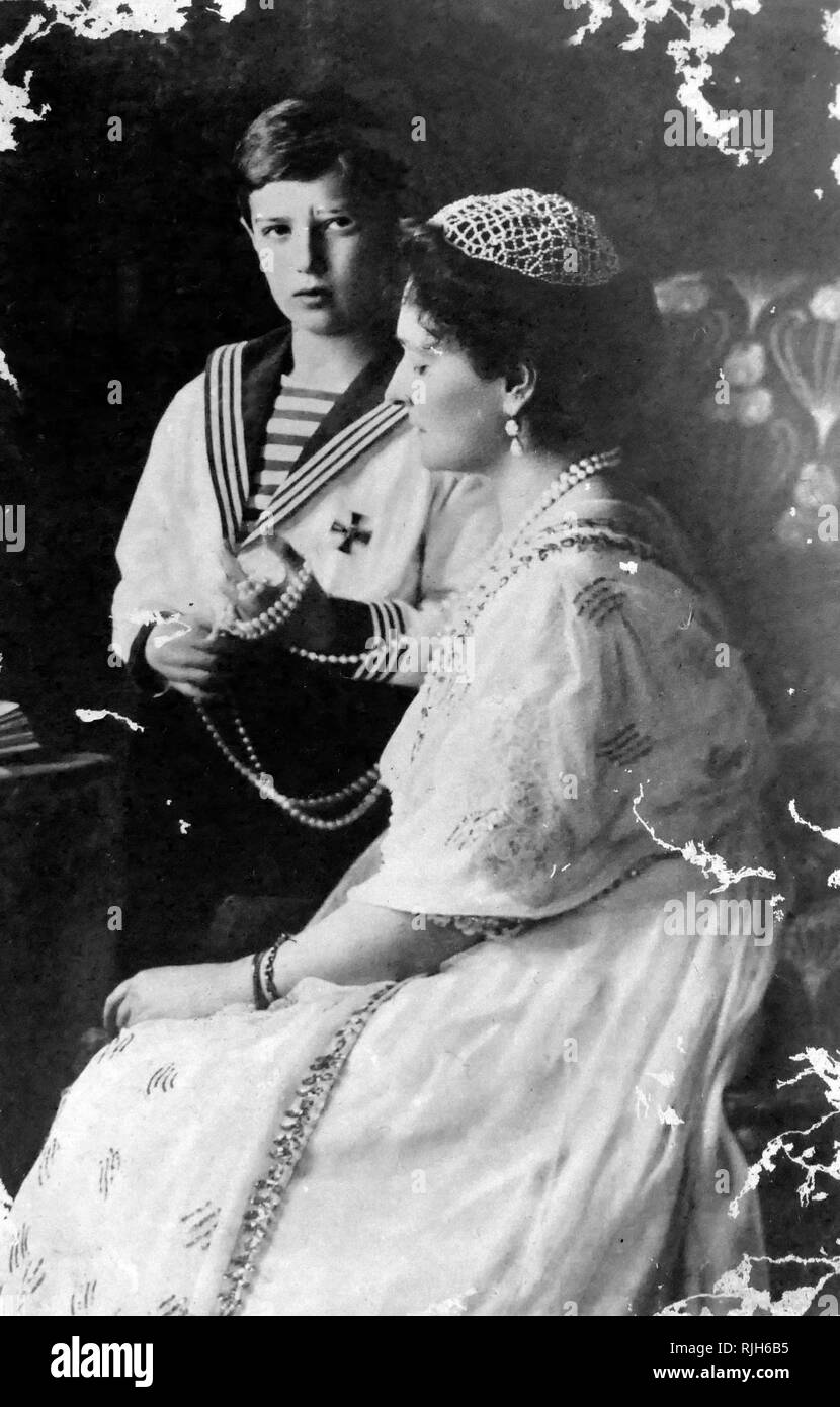 Photograph of the Tsarina of Russia, Alexandra with her son the Tsarevich, Alexis. 1913 Stock Photo