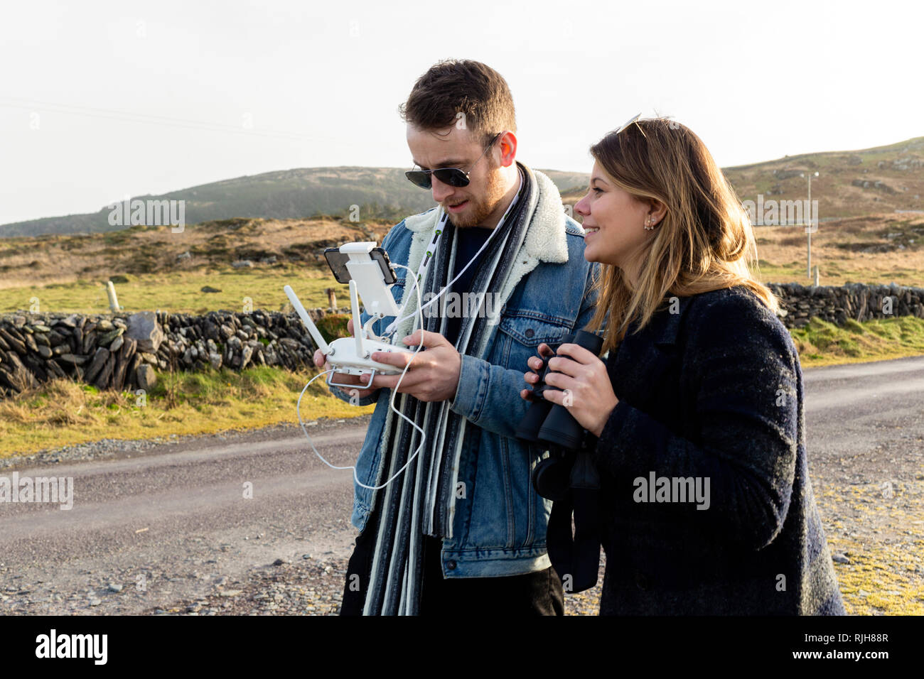 Tall man and short woman hires stock photography and images Alamy