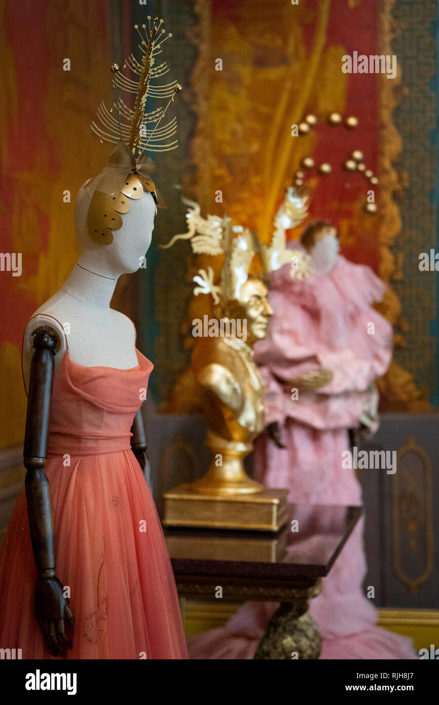 Hats designed by milliner Stephen Jones alongside House of Dior dresses at the launch of Chinoiserie-on-Sea exhibition which will fill the rooms of the Royal Pavilion, Brighton, East Sussex, with dozens of hats made by Jones throughout his 40-year career. Stock Photo