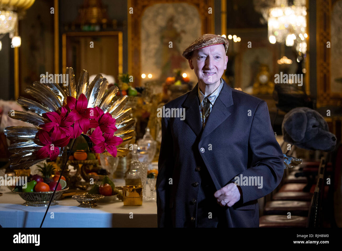 Milliner Stephen Jones with his hat that was specially commissioned for Kylie Minogue (2012) at the launch of Chinoiserie-on-Sea exhibition which will fill the rooms of the Royal Pavilion, Brighton, East Sussex, with dozens of hats made by Jones throughout his 40-year career. Stock Photo