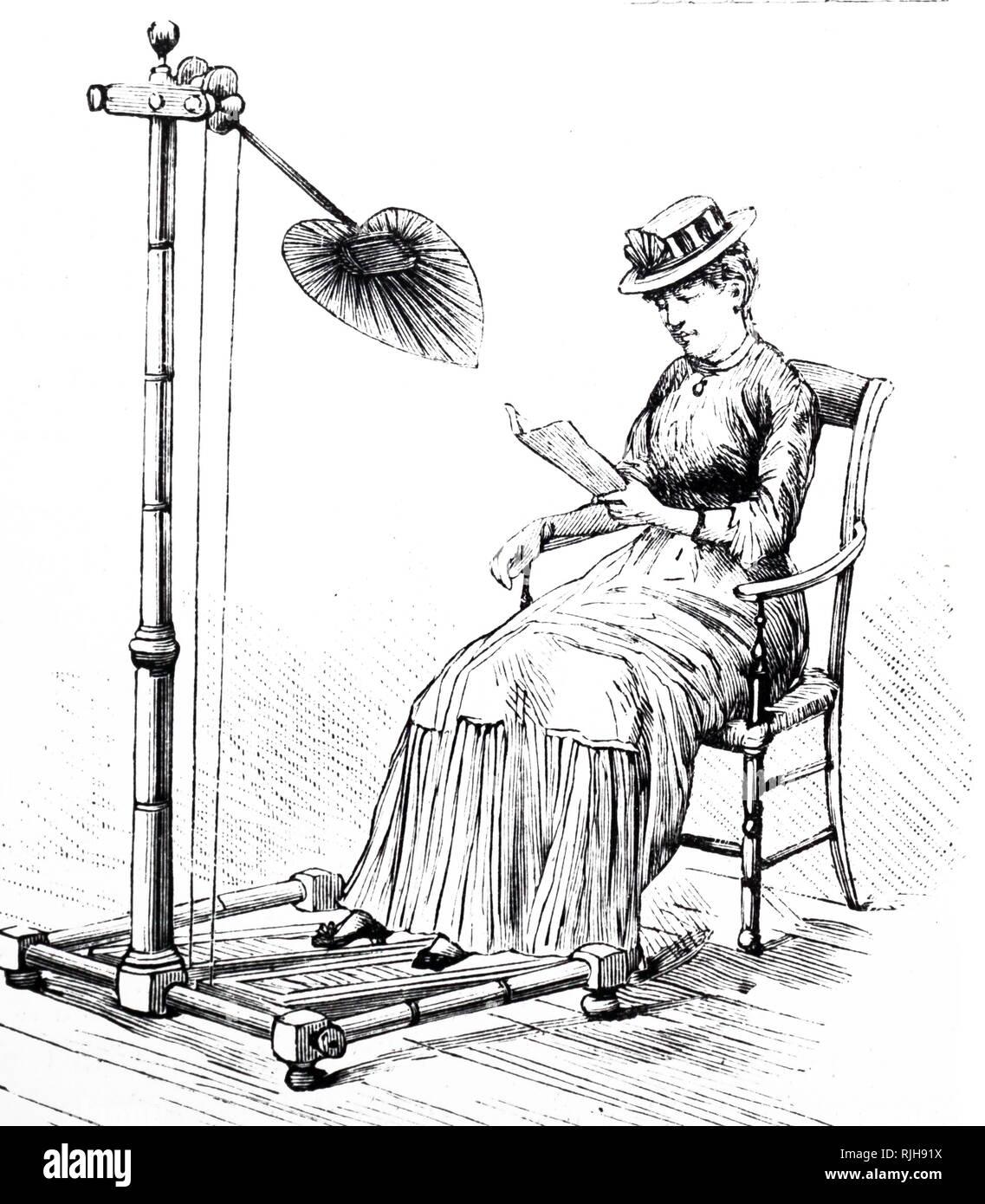 An engraving depicting a woman using a pedal operated punkah type ventilator to keep herself cool. Dated 19th century Stock Photo