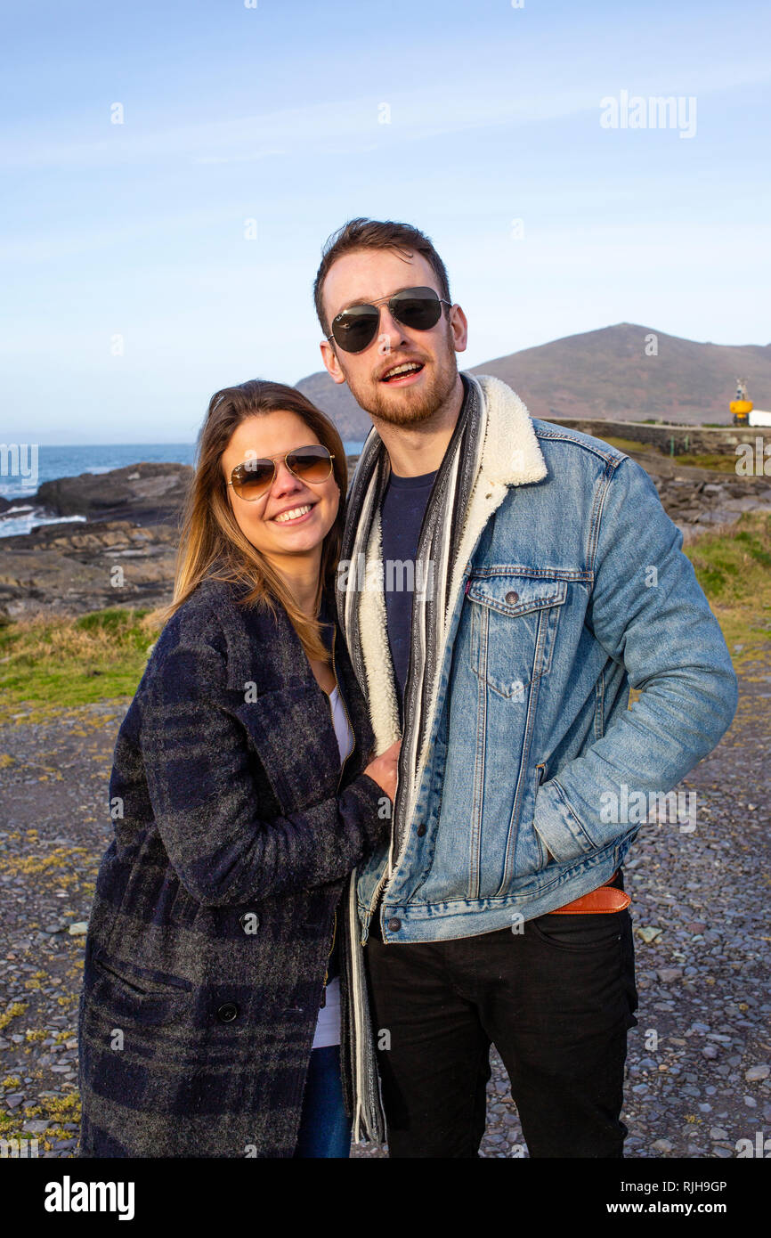 Attractive young couple, Irish male, Brazilian female, Valentia Island, County Kerry, Ireland Stock Photo