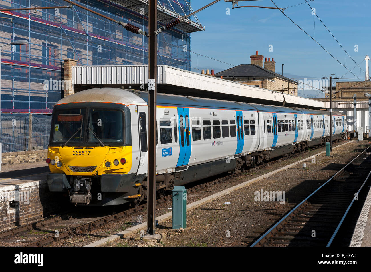 Class 365 Networker Express dual voltage electric multiple unit train in First Capital Connect livery waiting at a station in the UK. Stock Photo