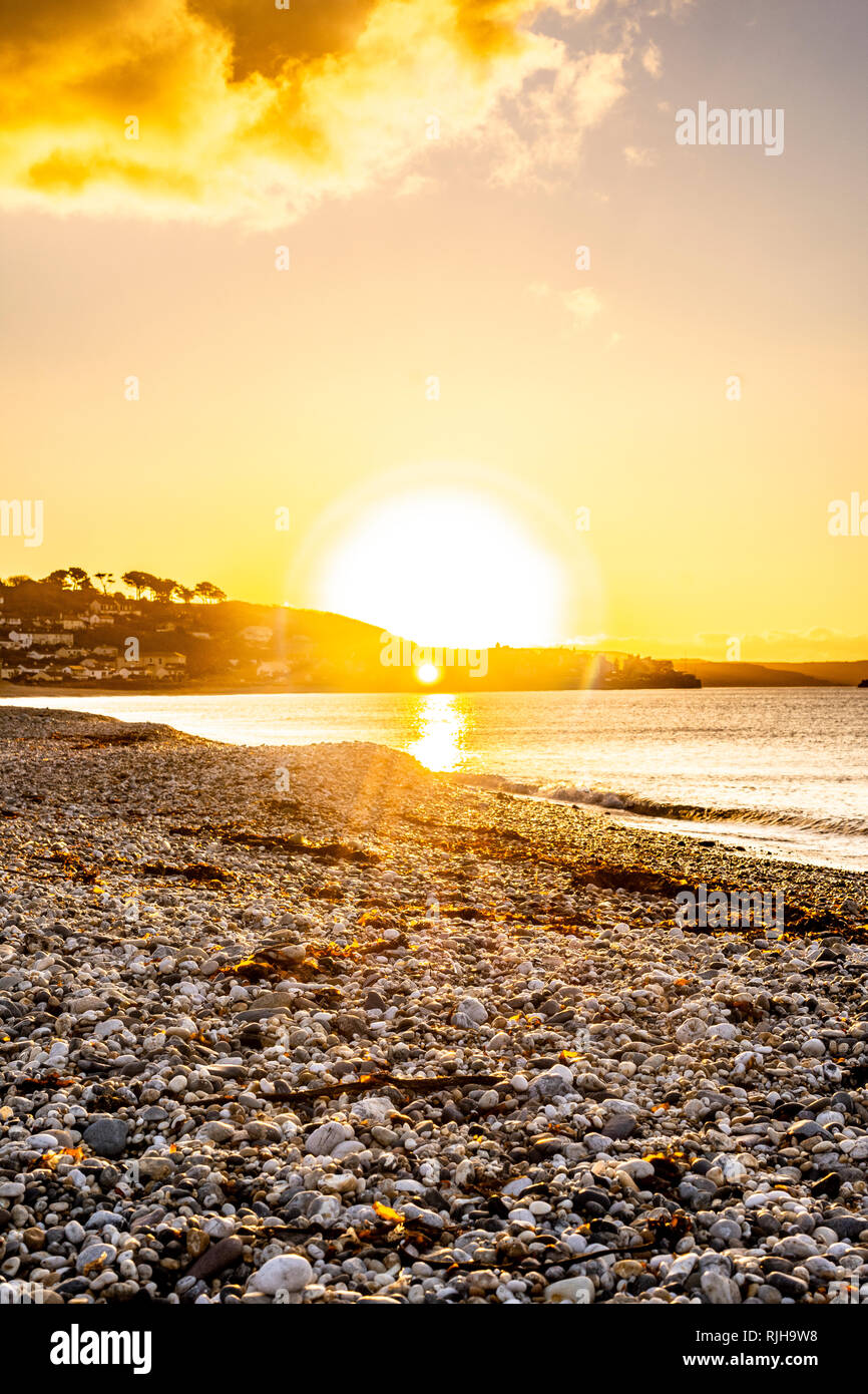 Coastal Sunrise over Beach adjacent to saint Michaels mount - Long Rock - Cornwall Stock Photo