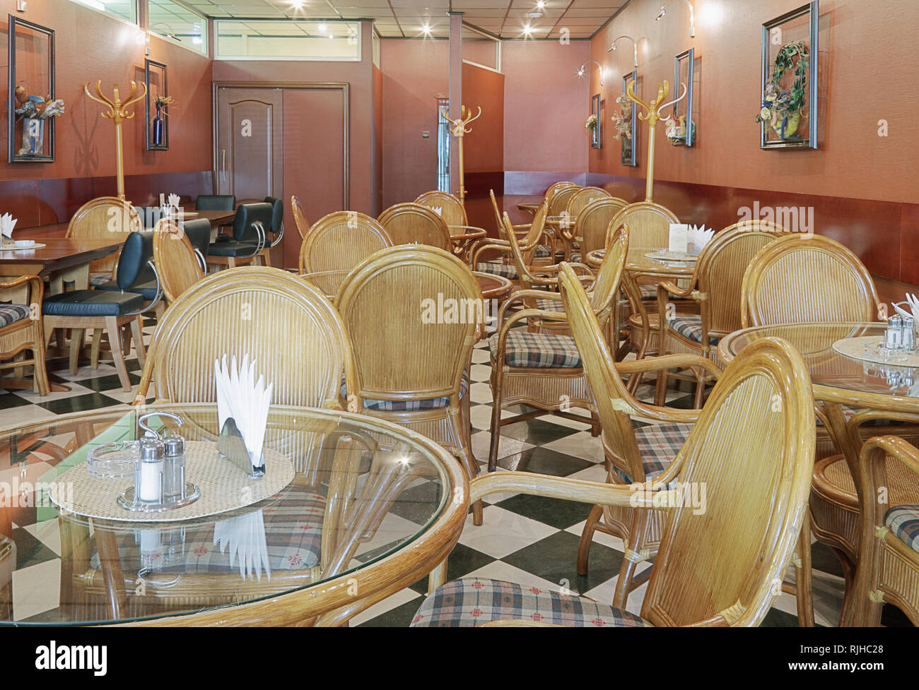 Cafe With Rattan Chairs and Tables Stock Photo - Alamy