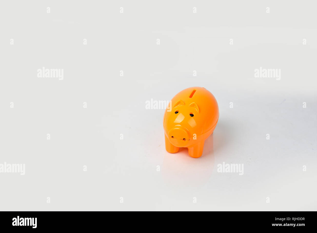 Piggy Bank isolated on white background Stock Photo - Alamy