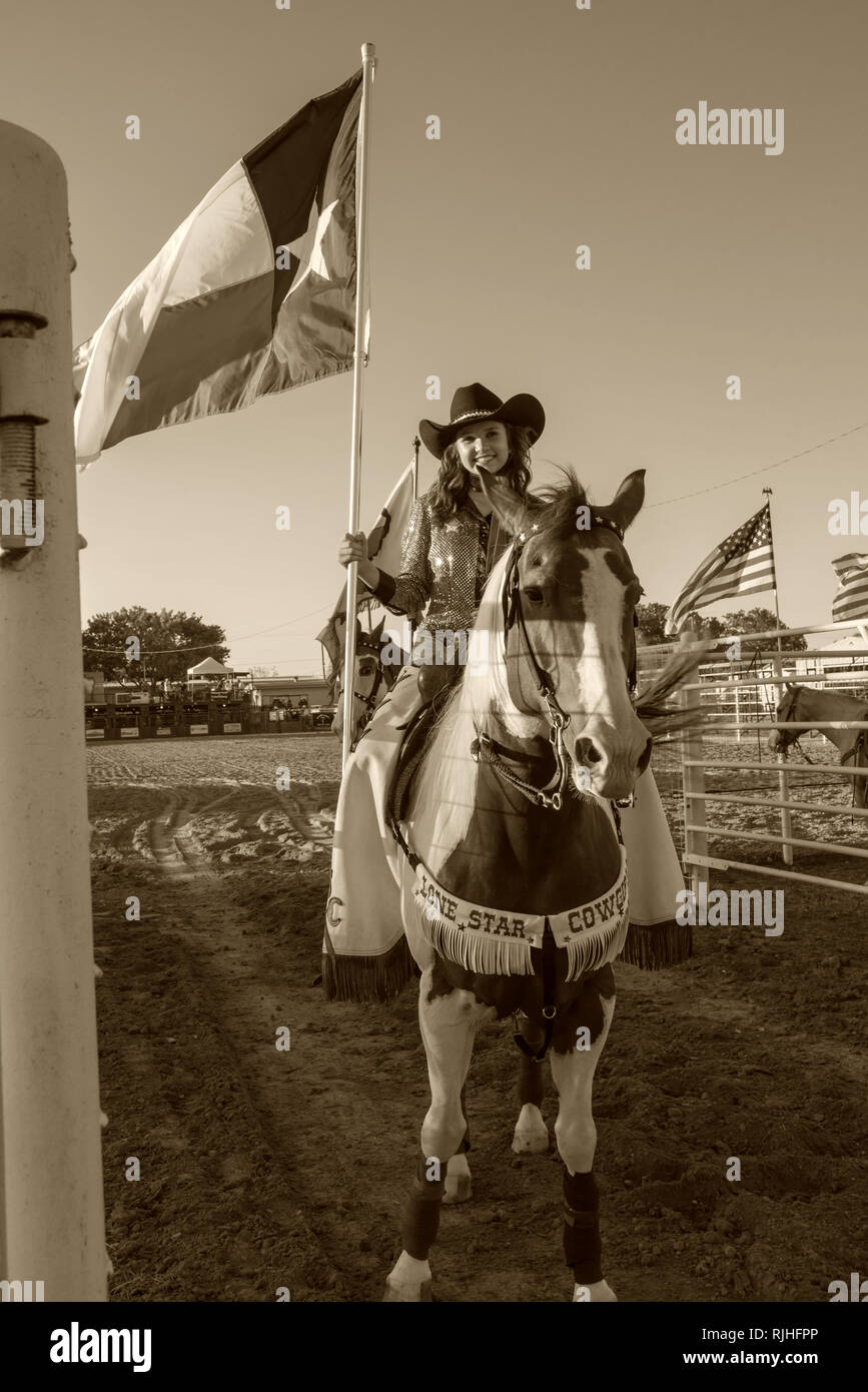 Rodeo entertainment The Lone Star Cowgirls showing pride and patriotism Stock Photo