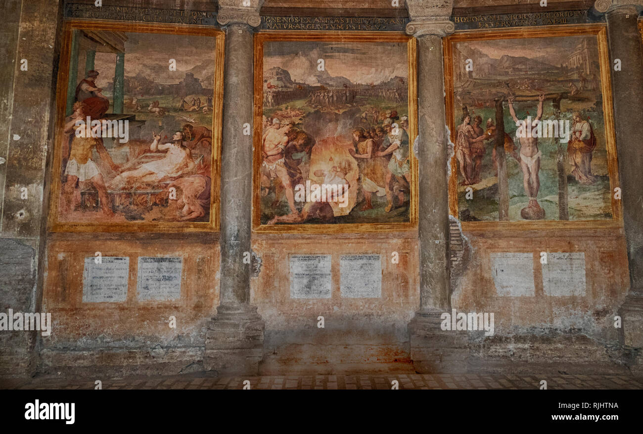 Basilica of St. Stephen in the Round on the Celian Hill, Basilica di Santo Stefano al Monte Celio, an ancient basilica and titular church in Rome, Italy, frescoes, portraying scenes of martyrdom Stock Photo