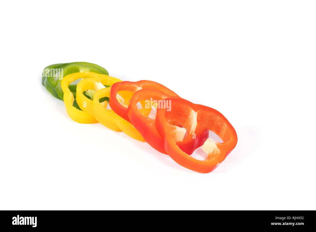 Three sliced green bell peppers hi-res stock photography and images - Alamy