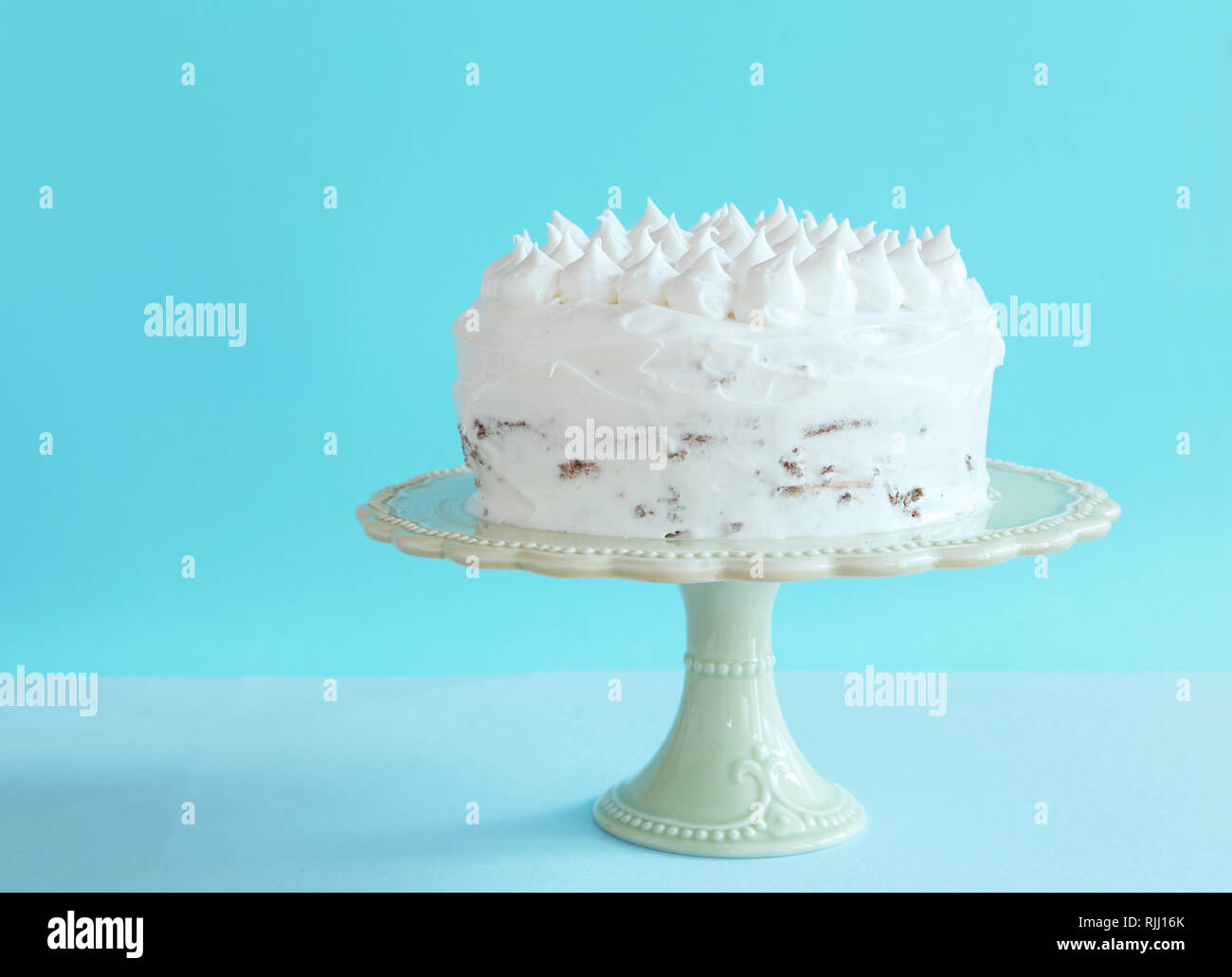 Birthday cake on blue background Stock Photo - Alamy