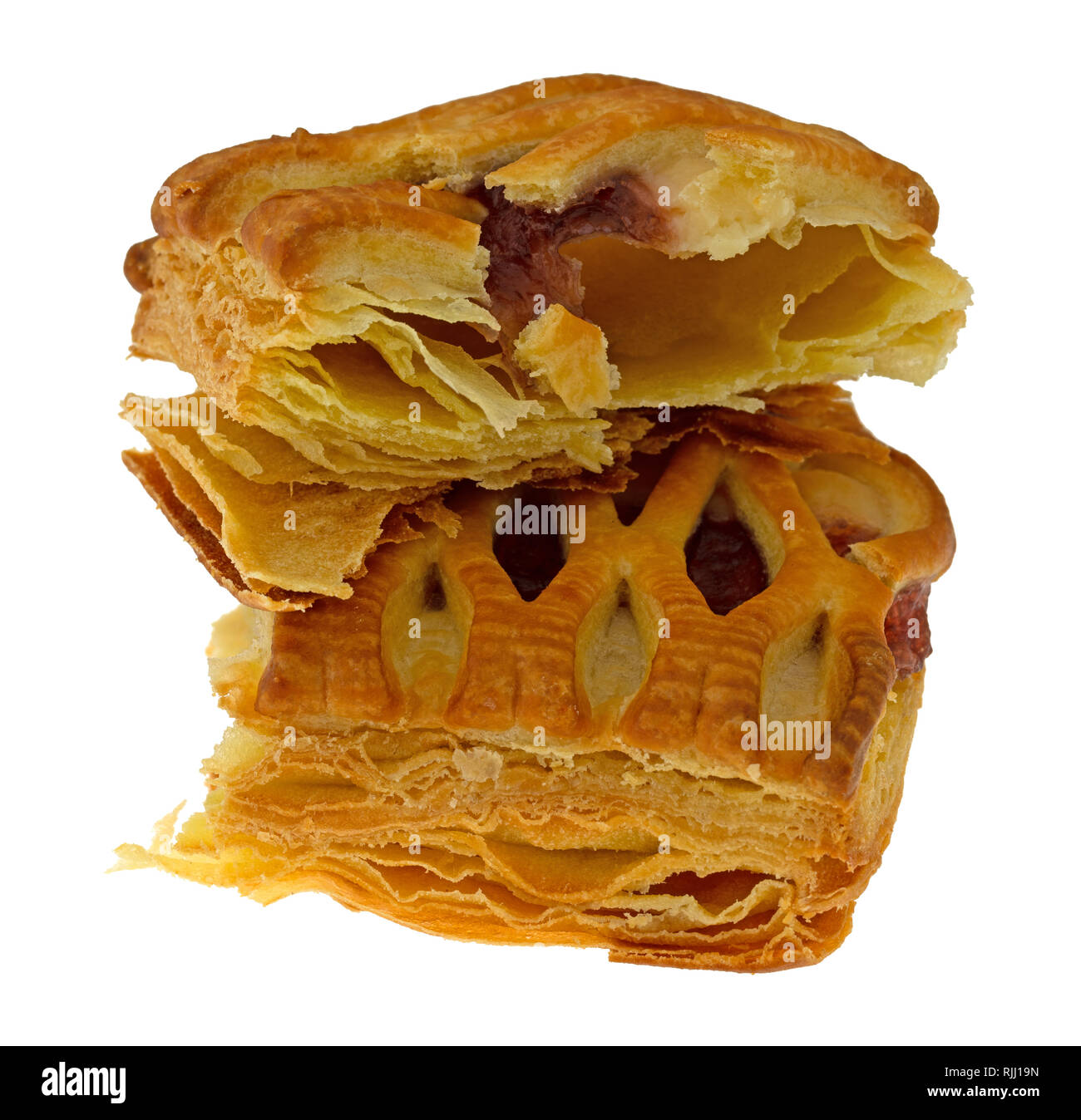 Side view of a broken pastry with cherry filling isolated on a white ...