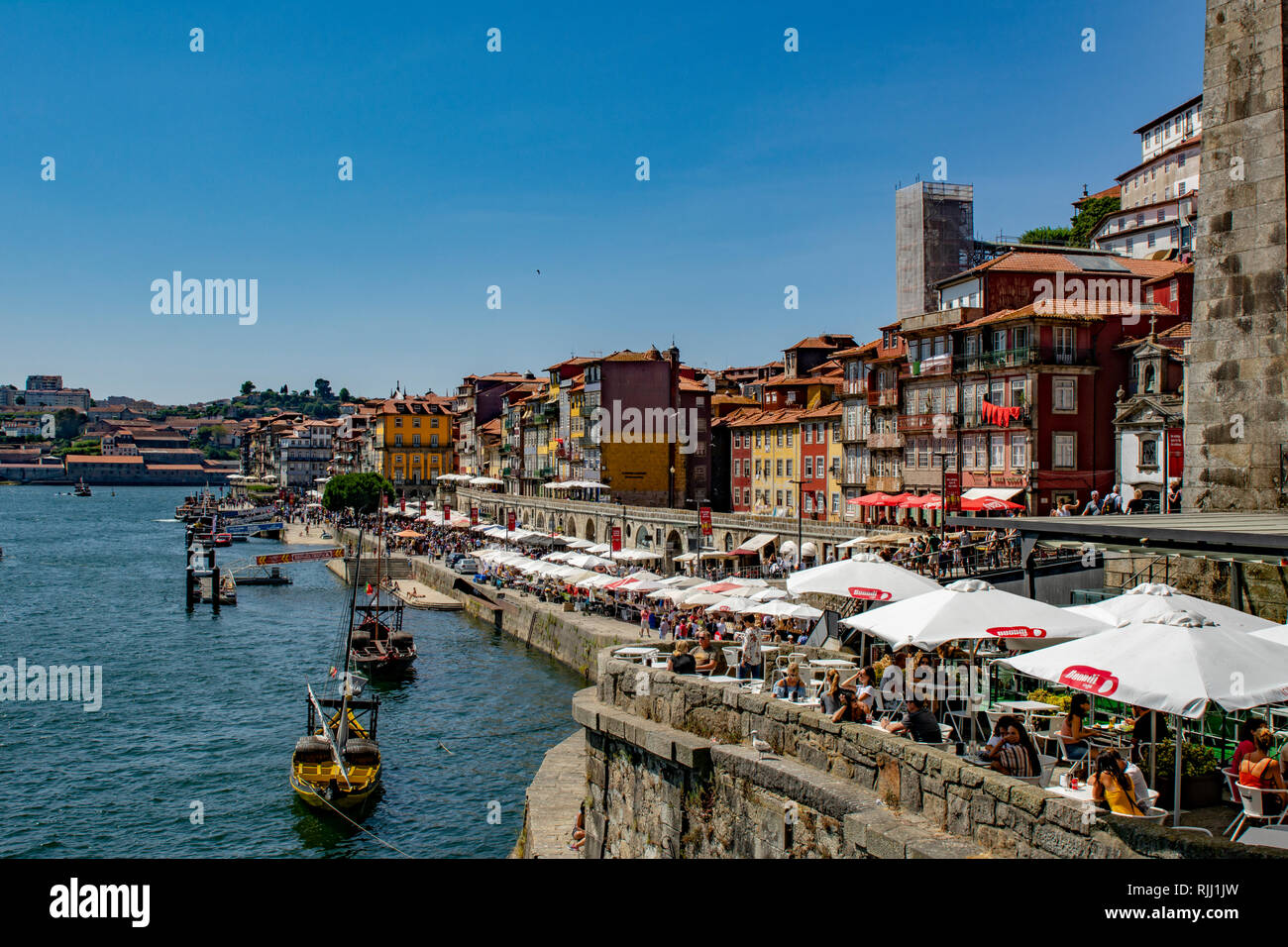 Porto Portugal August 2018 Traditional Boats With Wine Barrels And Porto Portugal August 2018 Traditional Boats With Wine Barrels And