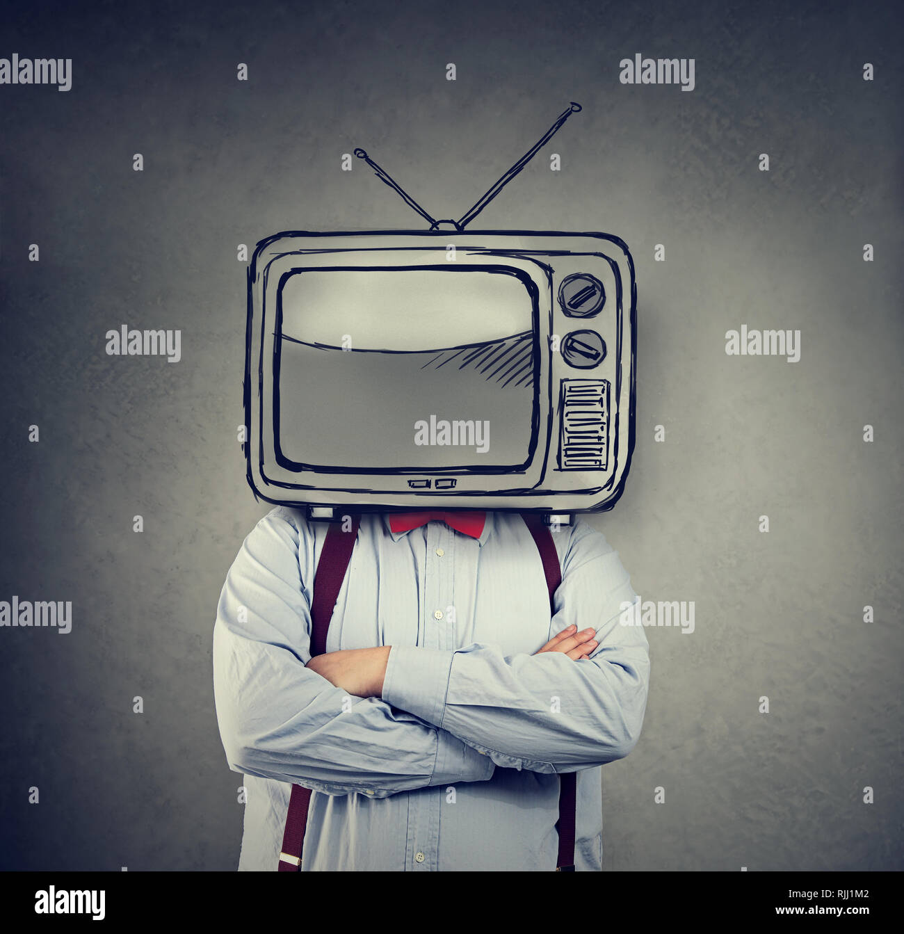Business man with TV set instead of his head on gray wall background Stock Photo