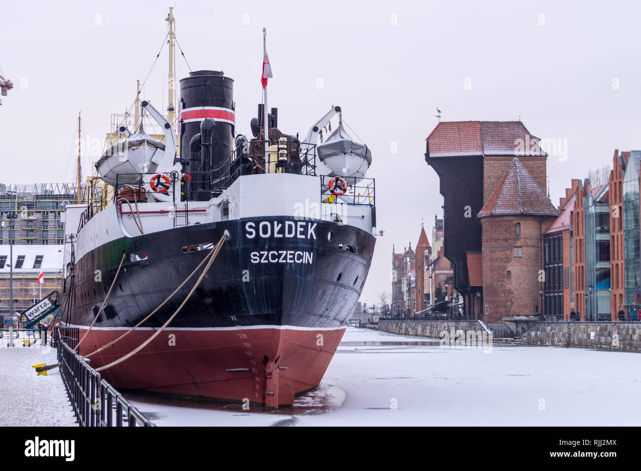 SS Sołdek, museum ship, Motława river waterfront and Crane, Zuraw, Rybackie Pobrzeże, Gdańsk, Poland Stock Photo