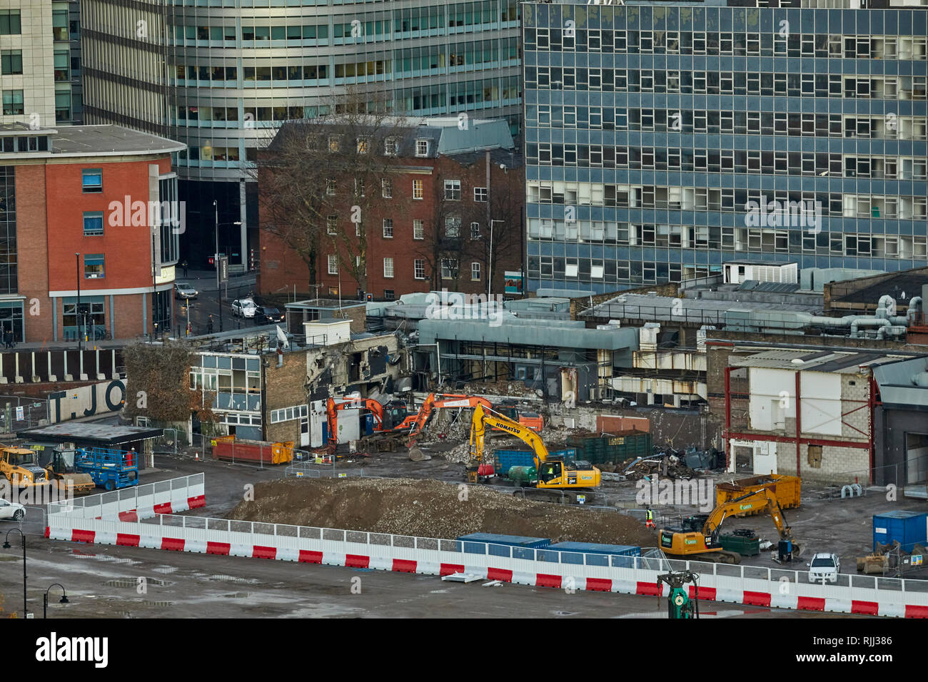 Manchester city centre skyline view across the rooftops from Salford