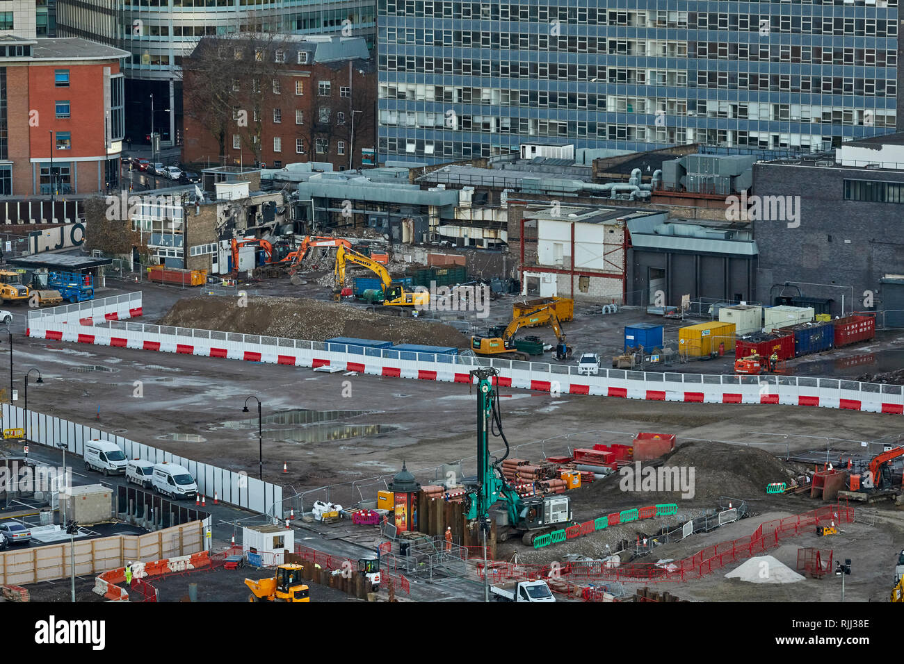 Manchester city centre skyline view across the rooftops from Salford