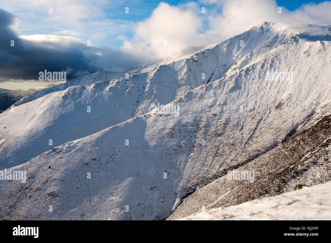 The ridges of Blencathra, a mountain in the Lake District National Park, Cumbria,UK., seen in winter snow Stock Photo