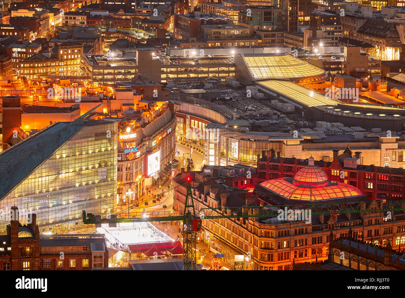 Manchester city centre skyline view across the rooftops from Salford