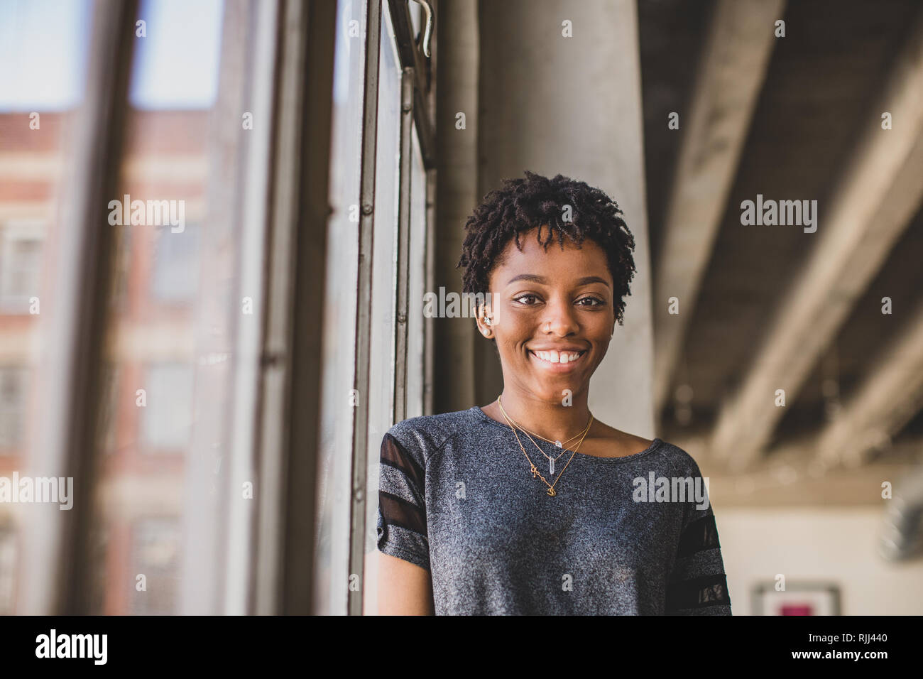 Portrait of young african american female looking to camera Stock Photo