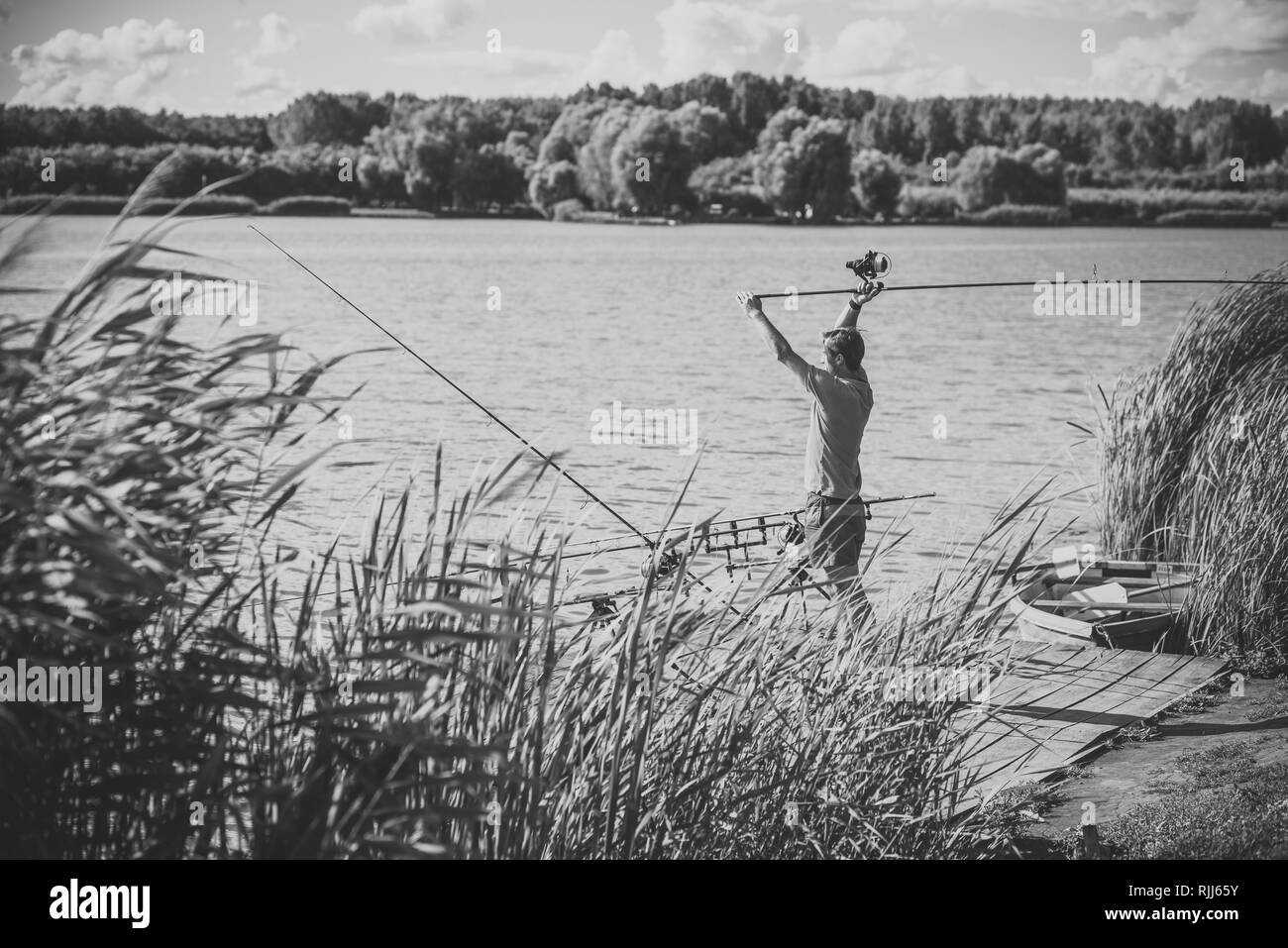 Spin cast rod Black and White Stock Photos & Images - Alamy