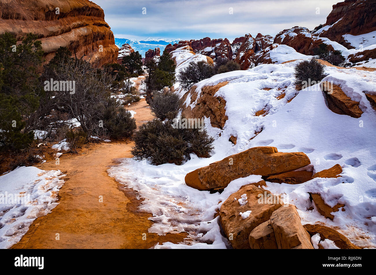 January 2019: A snow covered Devil's Garden Trail in Arches National Park, Moab, Utah. Stock Photo