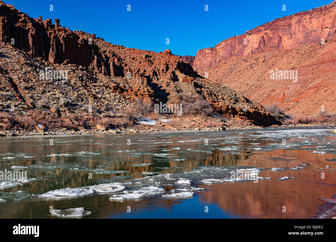 January 2019: The Colorado River winds its way along Utah Highway128 and provides a scenic drive into the red sandstone canyons near Moab, Utah. Stock Photo