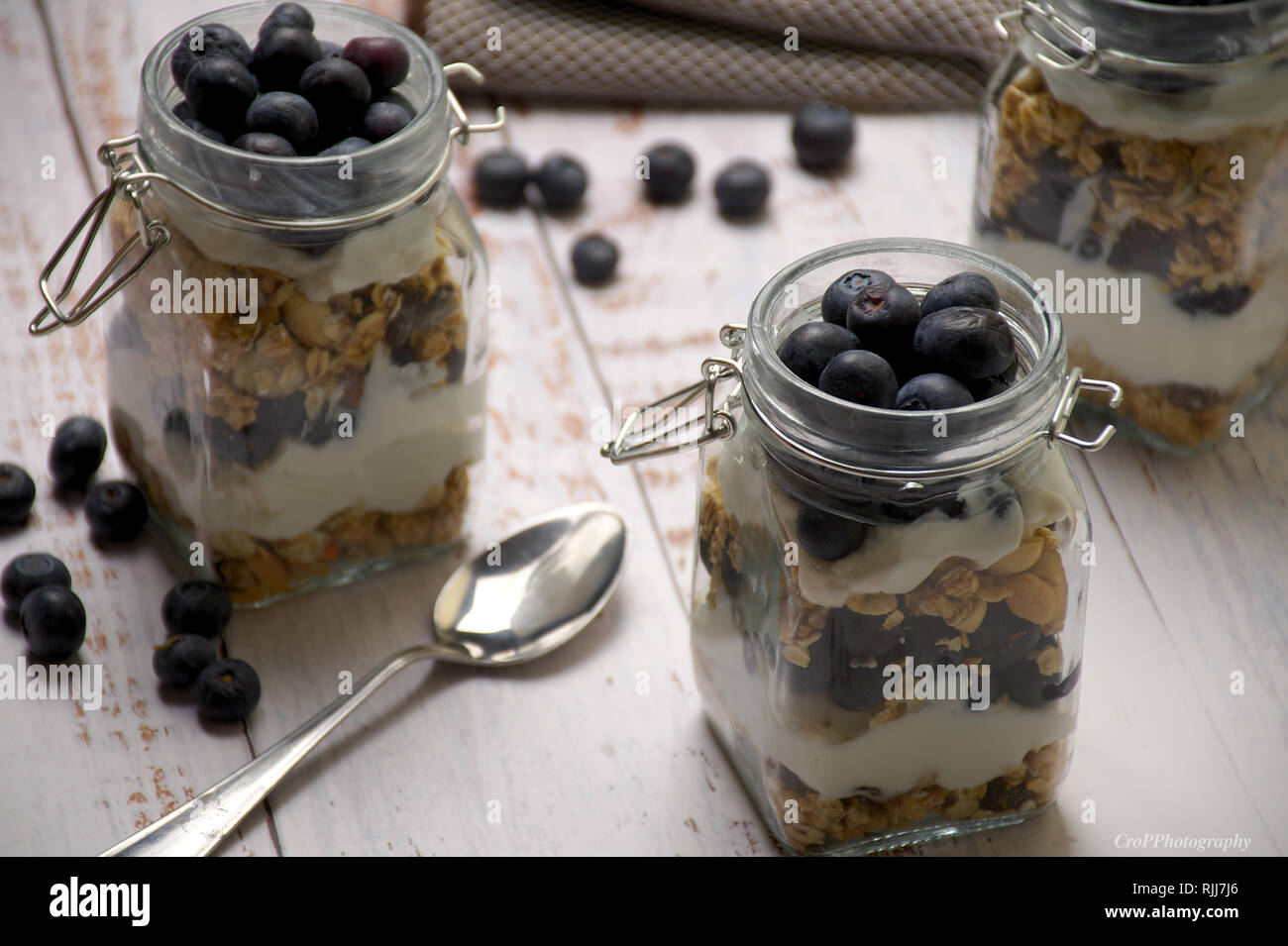 Yogurt Parfait with Blueberries , Oats and Raisins Stock Photo - Alamy