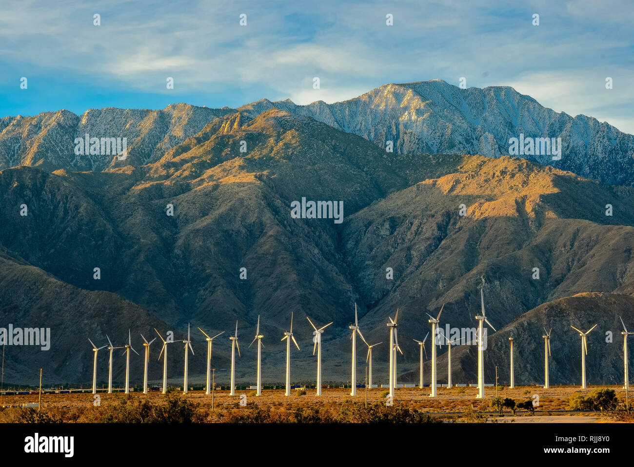 Large wind farm in desert area Stock Photo