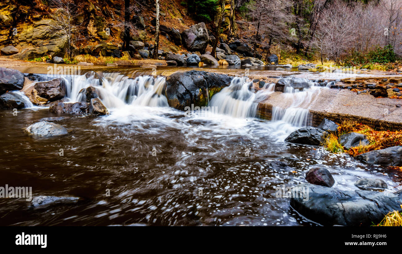 After heavy rainfall, water from Oak Creek flooding the road crossing