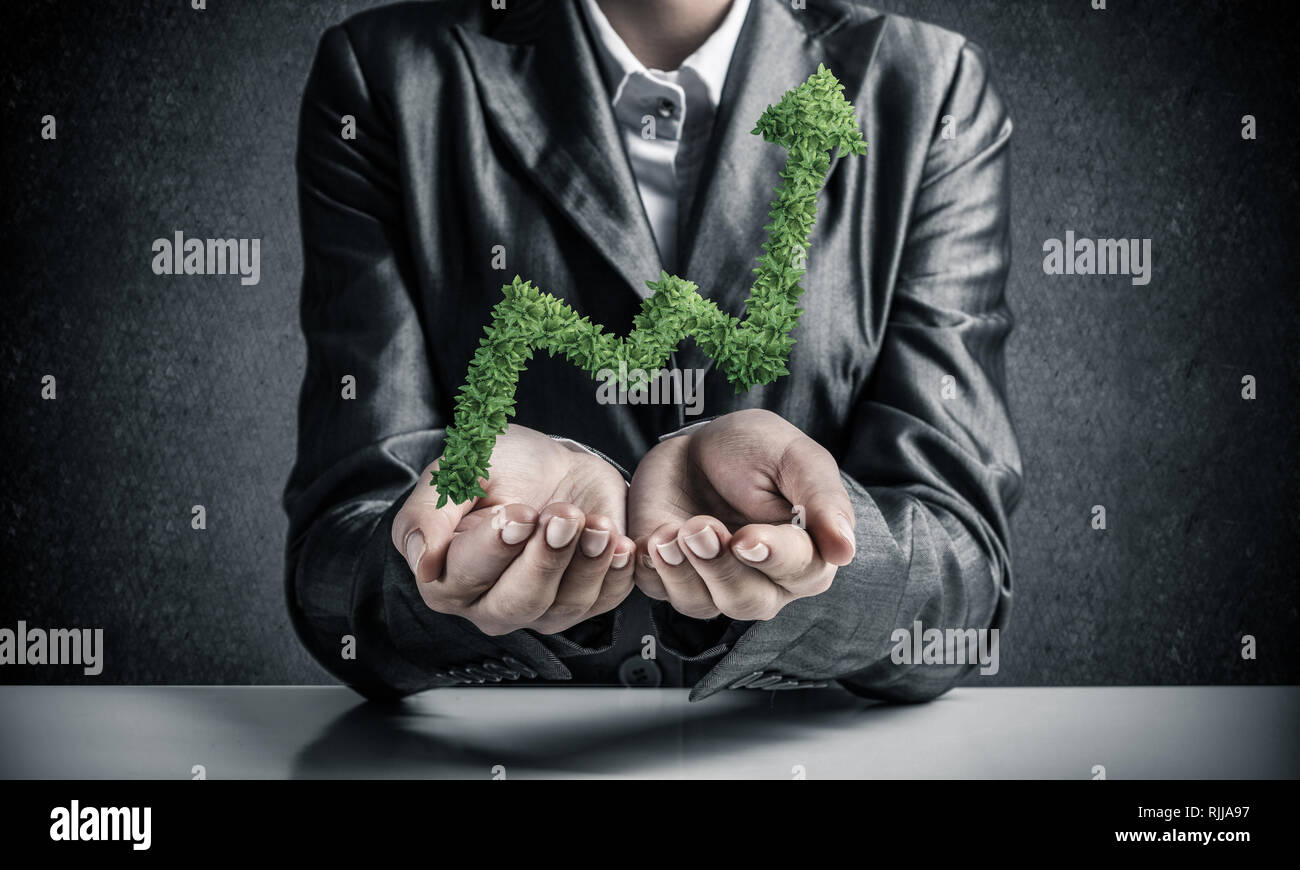Businessman presenting growing graph Stock Photo - Alamy