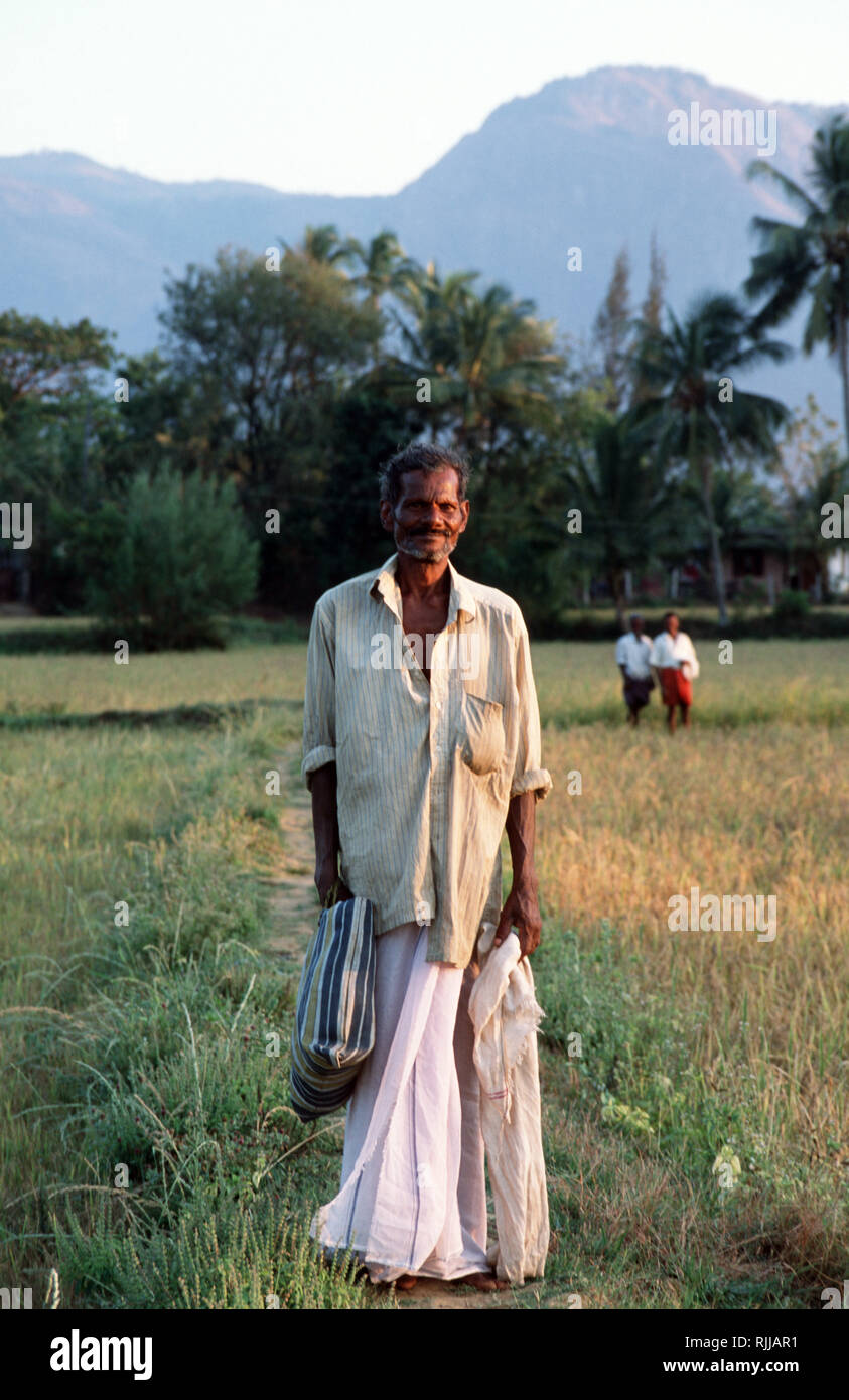 Indian man in traditional lungi hi-res stock photography and images - Alamy