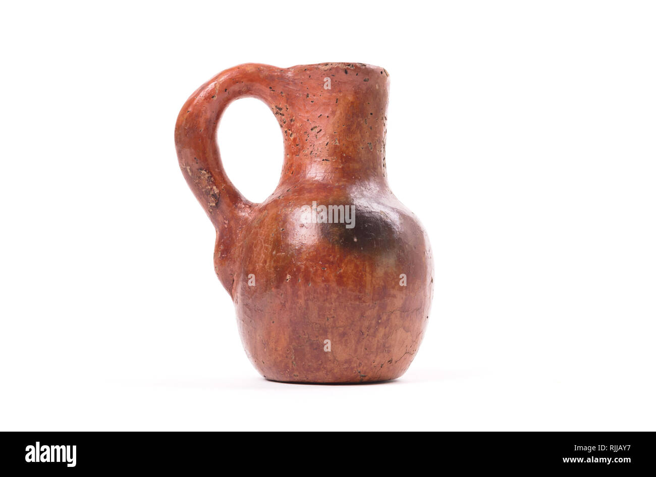 Ceramic old vase, small, isolated on white background Stock Photo - Alamy