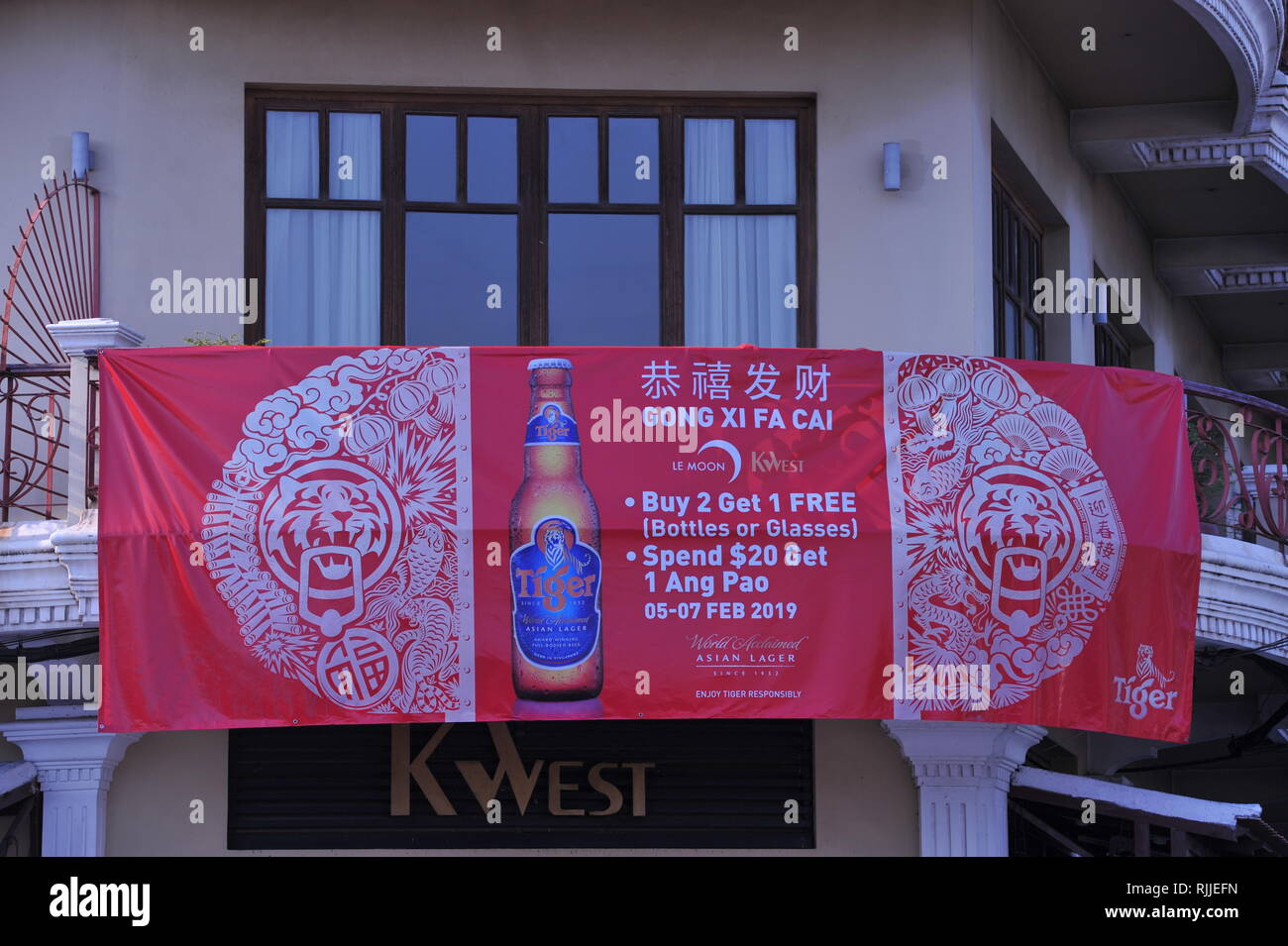 Tiger Beer Puts Up A Bilingual Promotional Banner On The Riverside