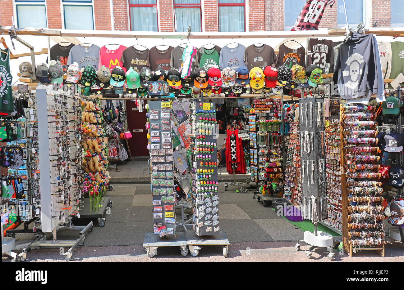 AMSTERDAM, NETHERLANDS - MAY 15, 2018: Large souvenir shop on Amsterdam street with lots of different memorabilia objects tourist can chose from Stock Photo