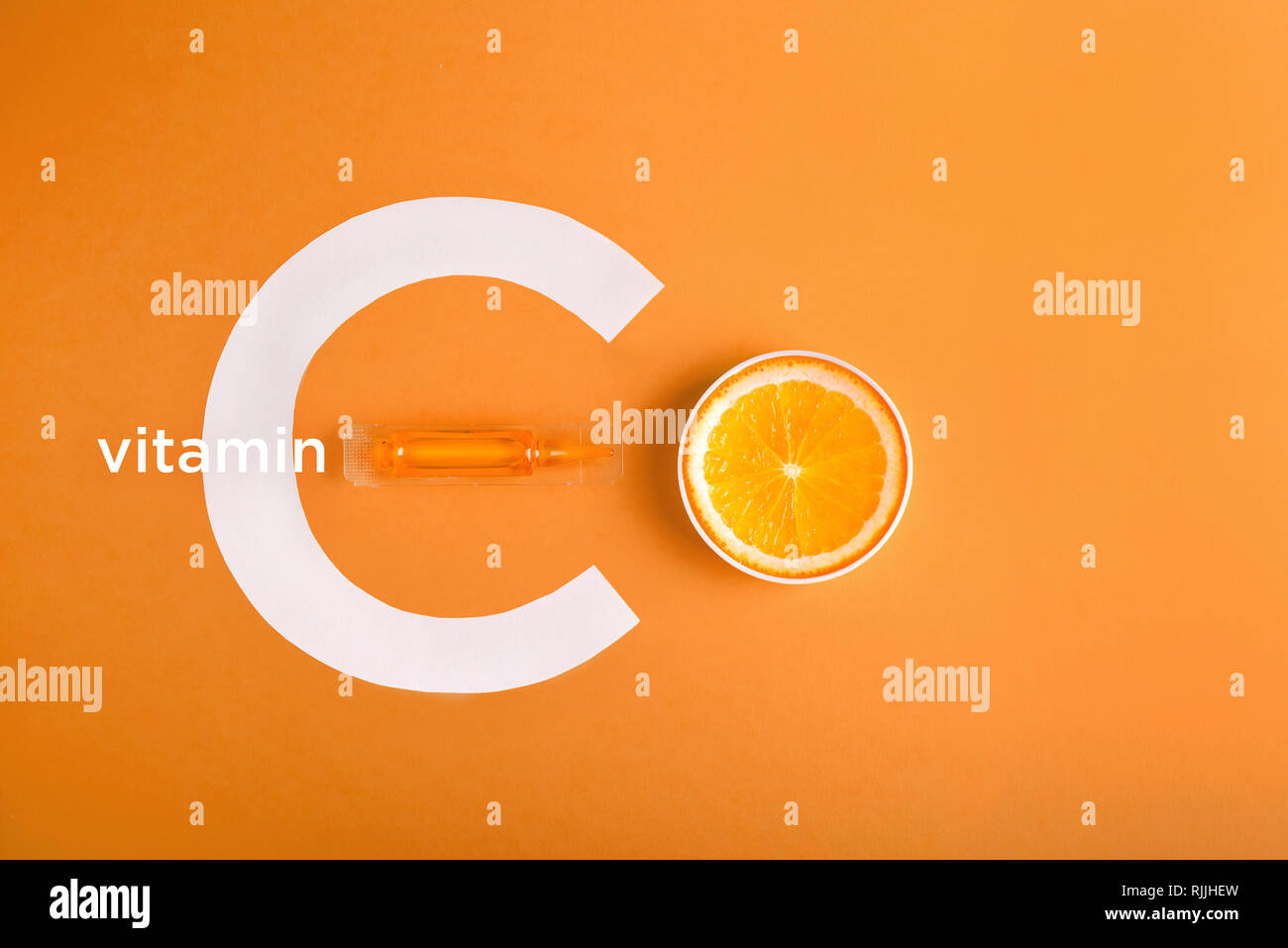 Serum and cosmetics with vitamin C. Essential oil from citrus fruits