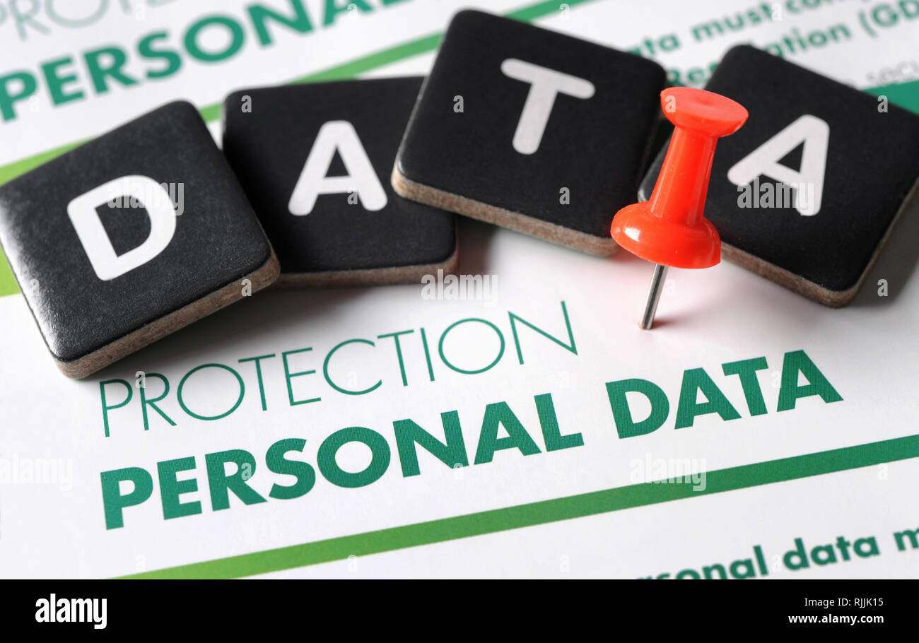 PERSONAL DATA PROTECTION LITERATURE WITH WORD TILES RE SECURITY FRAUD CRIMINALS ETC UK Stock Photo