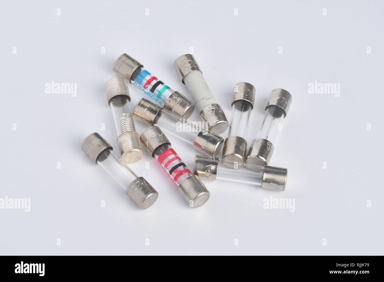 Fuses.A selection of 20 x 5mm fuses both Glass bodied and Ceramic bodied, fast acting and slow blow (Time delay).For use in a multitude of application Stock Photo