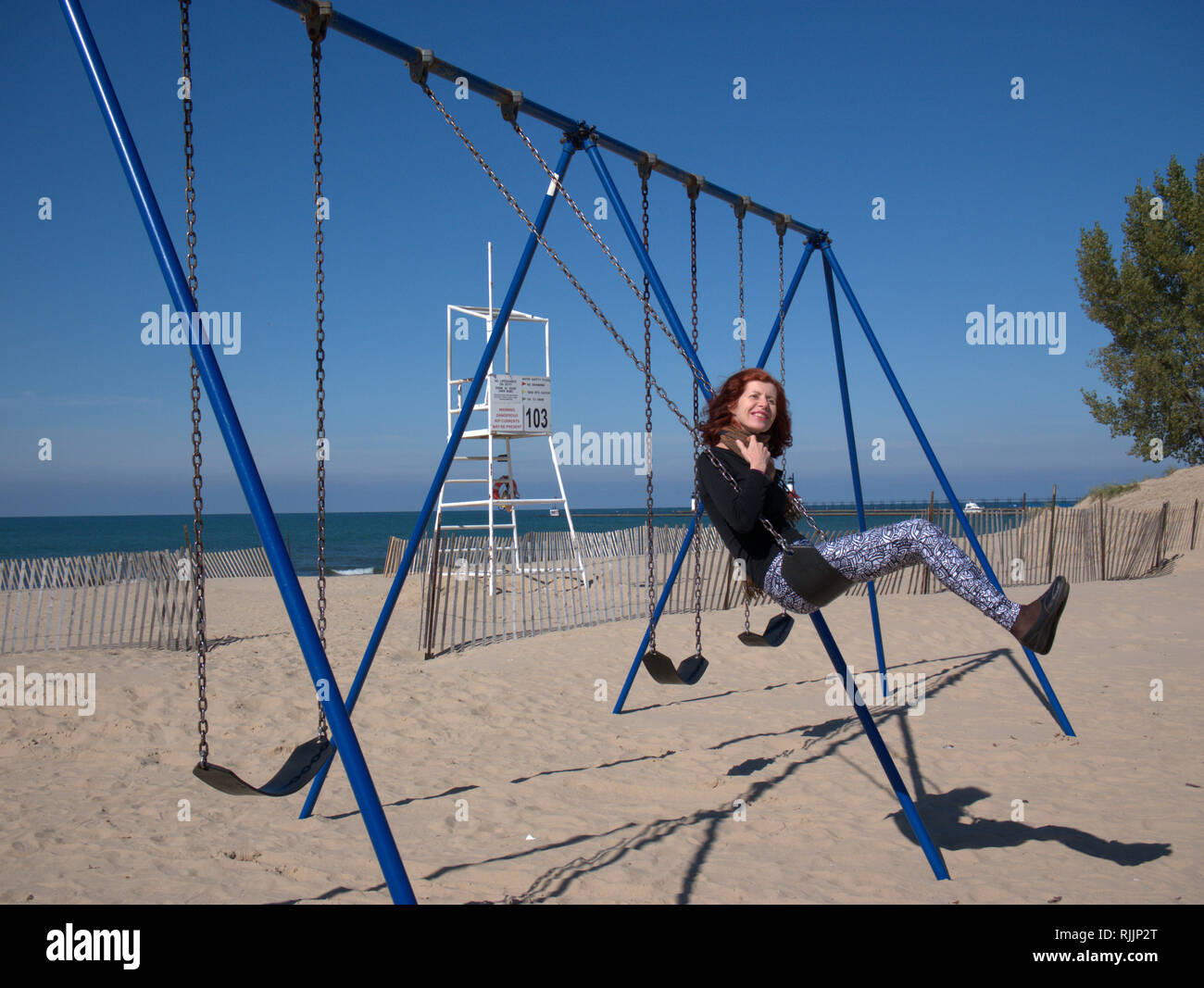 Mature woman summer swing hi-res stock photography and images - Alamy