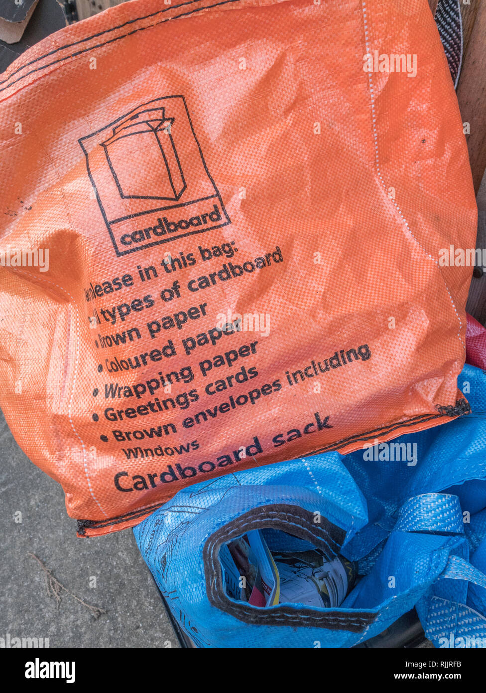 Domestic cardboard and paper recycling bag outside house in Cornwall Stock  Photo - Alamy