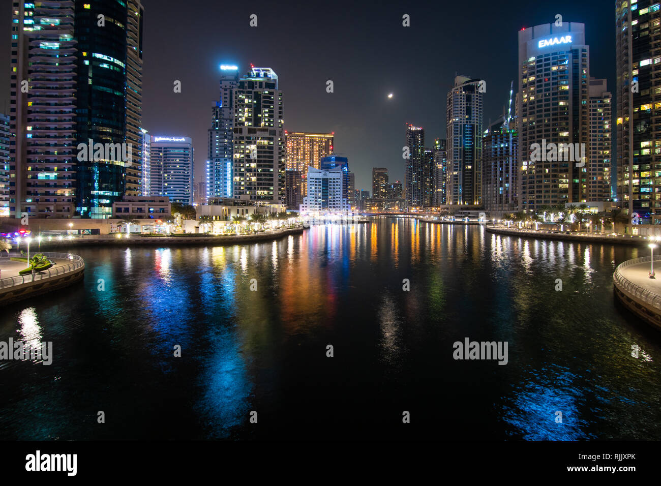 Colorful city lights at night time in Dubai Marina, United Arab