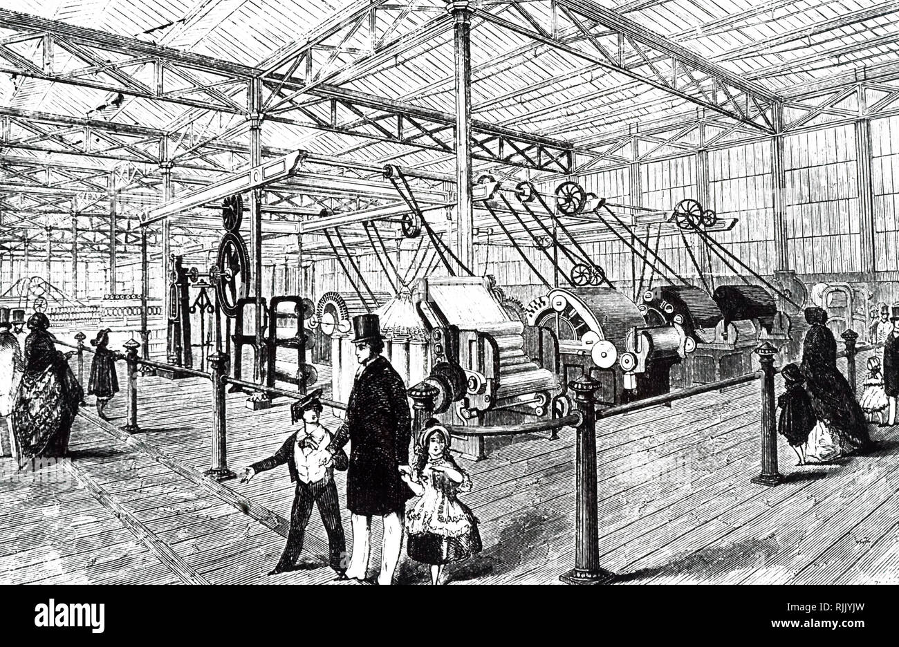 An engraving depicting power looms and spinning mules on show at the Crystal Palace. Dated 19th century Stock Photo