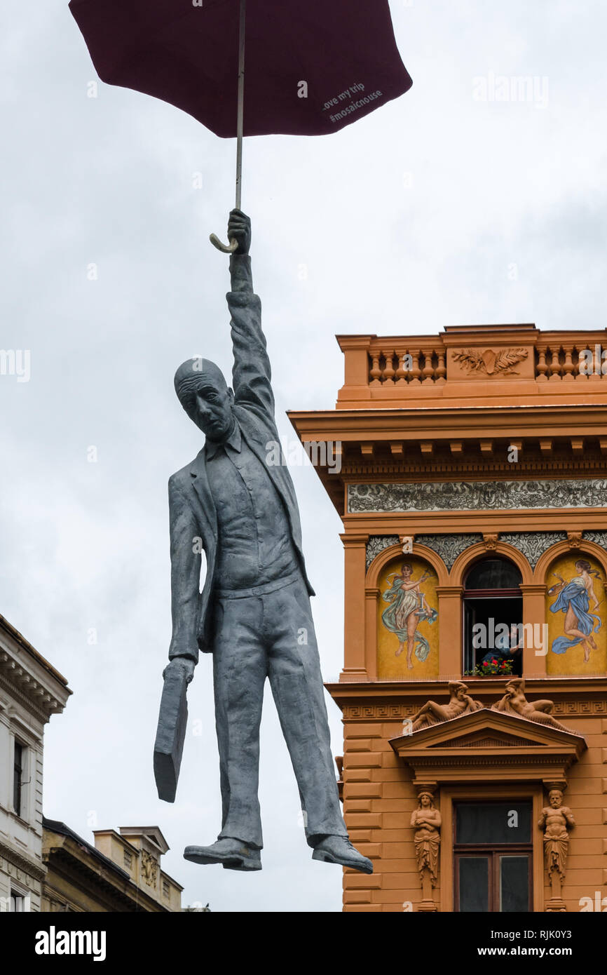 Slight Uncertainty by Michal Trpak, Umbrella Hanging Man, art