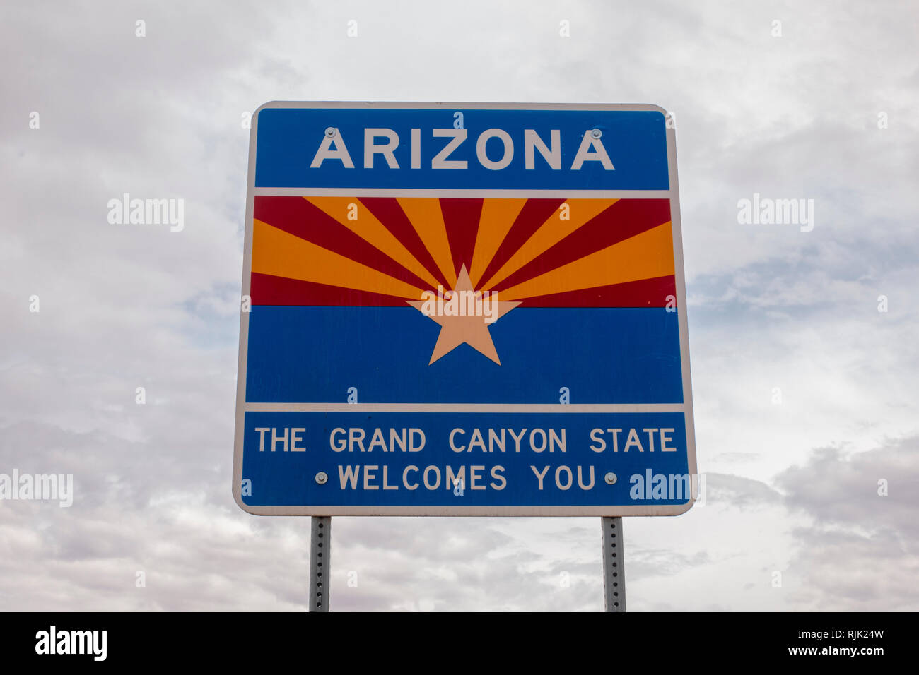 'The Grand Canyon State Welcomes You' rad side sign advising drivers they are entering the state of Arizona, United States. Stock Photo