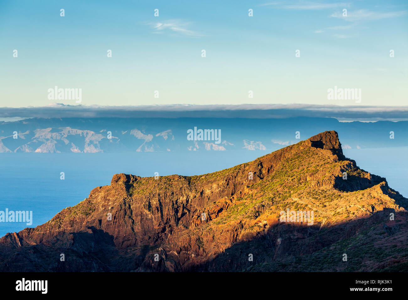 View west to La Gomera from the ridge above Masca barranco at dawn on Tenerife, Canary Islands, Spain Stock Photo