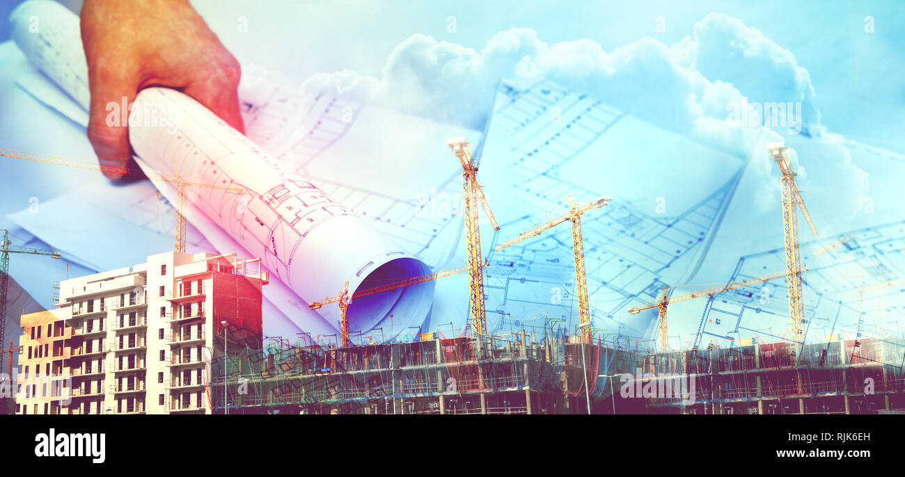 Cranes,buildings and construction concept.Architect and blueprint background Stock Photo