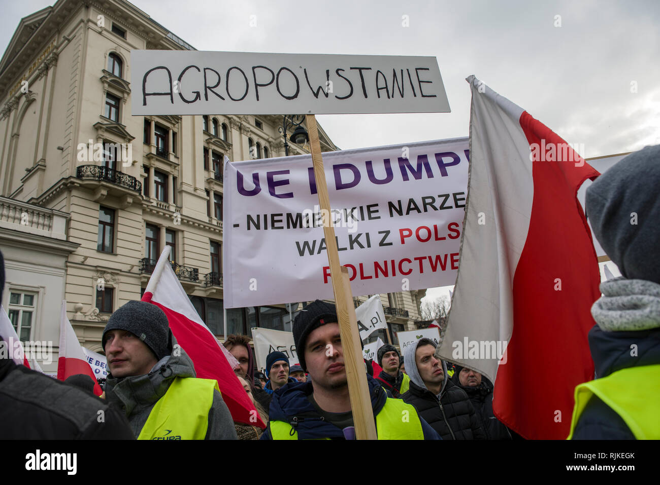 A protester seen holding an 'Agro uprise' placard during the protest. Thousands of farmers from across Poland staged a protest outside the presidential palace in Warsaw, demanding repayment of various compensations, control and restrictions over the imports of agricultural products as well as an increase of purchase prices, The demonstration was held by the Agrounia group and had been billed by farmers as the 'Siege of Warsaw.' Farmers took a coffin for the president as a symbol of the death of the polish agriculture. Stock Photo