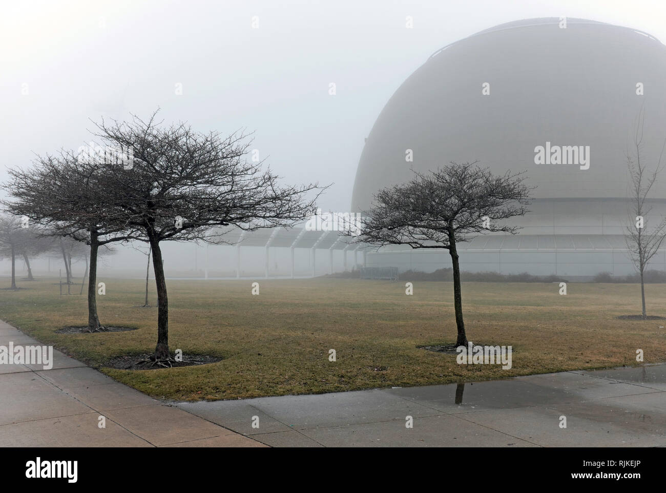 Cleveland, Ohio, USA. 6th Feb, 2019.  The Cleveland Clinic IMAX dome theater at the Great Lakes Science Center in Cleveland Ohio USA, stands out in the fog shrouded north coast harbor winter landscape.  Credit: Mark Kanning/Alamy Live News. Stock Photo